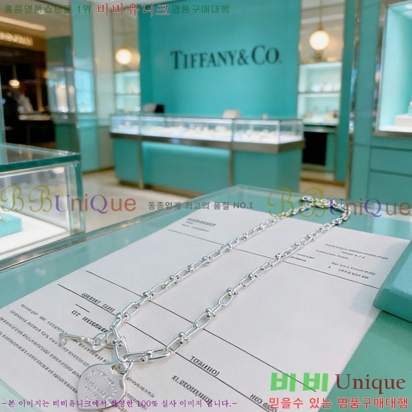 �������� Ƽ�Ĵ� ����� TI234457-5